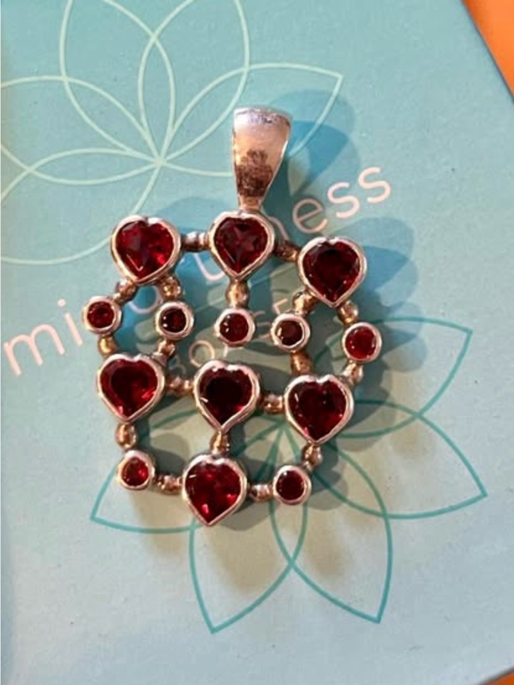 Unique Sterling Silver garnet multi-Heart Pendant.